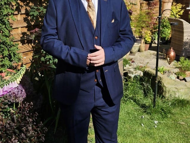 Joseph White in a sharp suit.