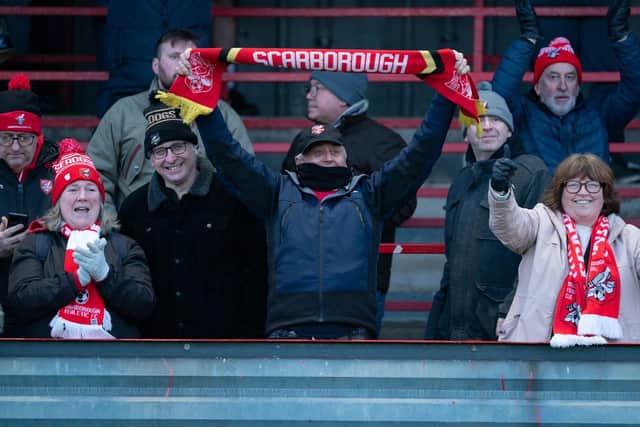 Boro fans cheer on their team against Curzon Ashton. Photo by Wandering Photography