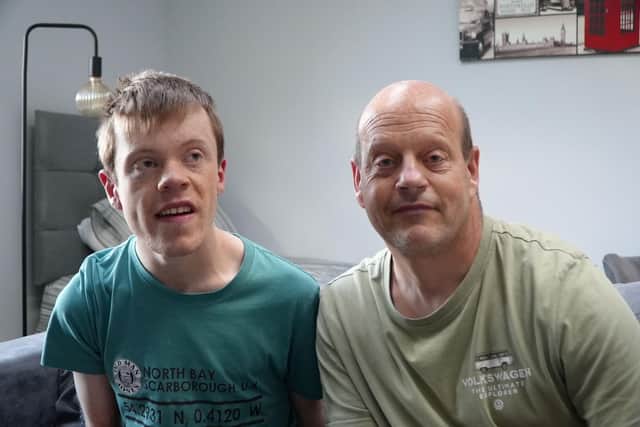 Andrew Roberts and his son, Jake, at their Scarborough home which has been redesigned to allow the 21-year-old, who has cerebral palsy, to live more independently.