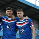 Josef Wheatley, Stephen Walker and Priestley Griffiths celebrate signing their new contracts at Whitby Town.