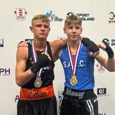 Scarborough's Danny Kelwick, right shows off his National Junior Cadet Championships gold medal after beating Ethan Fountain, left.