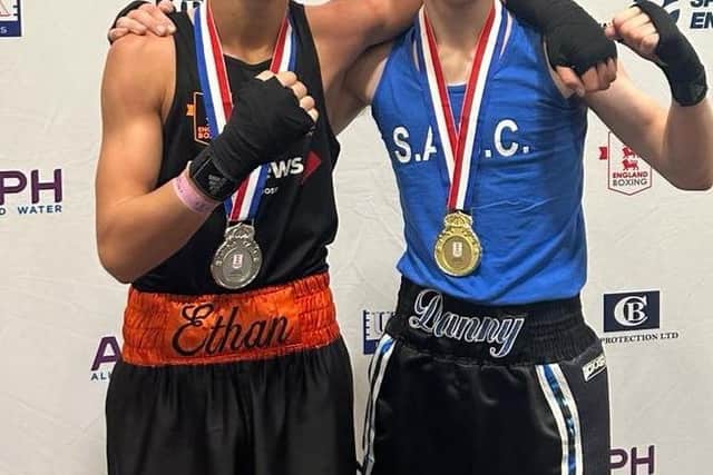 Scarborough's Danny Kelwick, right shows off his National Junior Cadet Championships gold medal after beating Ethan Fountain, left.