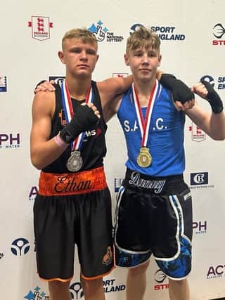 Scarborough's Danny Kelwick, right shows off his National Junior Cadet Championships gold medal after beating Ethan Fountain, left.
