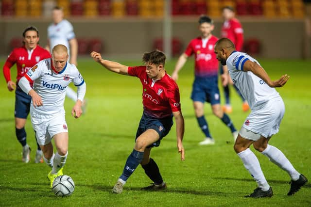 Olly Dyson, centre, in action for York City in 2021 has signed on loan for Boro.  Picture Bruce Rollinson