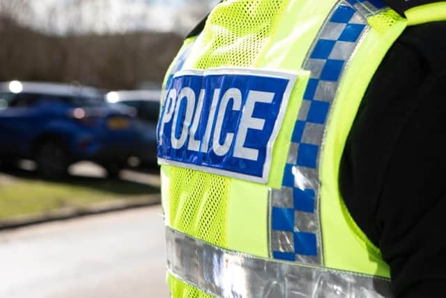 Police are investigating after a BMW crashed into parked cars in Scarborough.