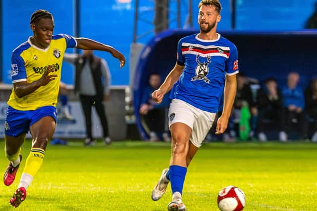 Lewis Hawkins in action for Town.