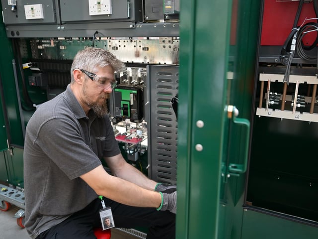 Dan works on one of the products. photo: Richard Ponter