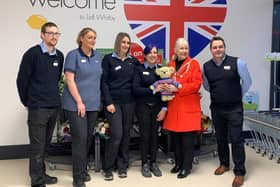 Mayor of Whitby, Cllr Linda Wild, and some of the Lidl staff, at the store reopening.