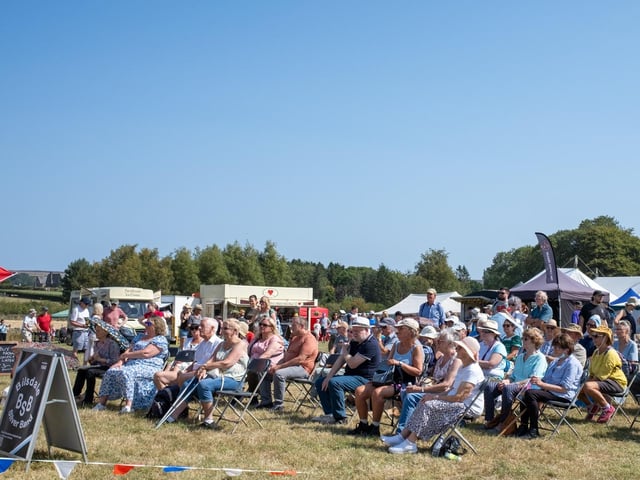 The crowd enjoys the band.