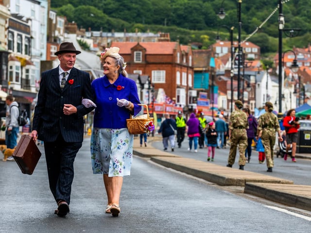 Mark William Pridmore and Tina Beatie Pemberton, of Sheffield, dressed in 1940's attire walking along Foreshore Road