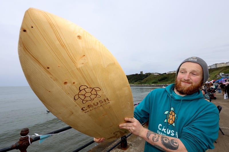 Danny Steele with his handmade Surfboard.