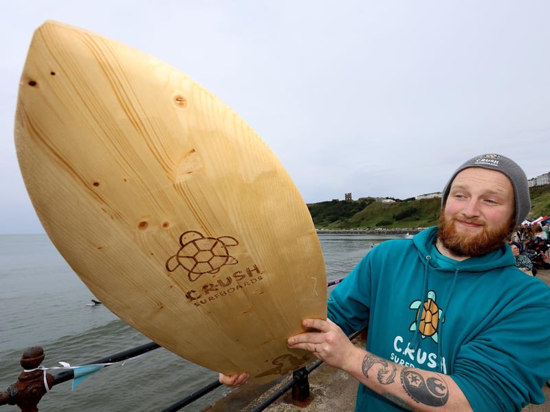 Danny Steele with his handmade Surfboard.