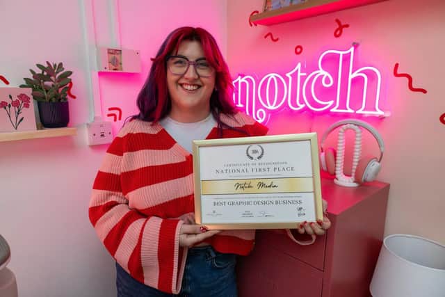 Anja Drop with the certificate for Best Graphic Design Business. Photo by Lucy Halkyard.