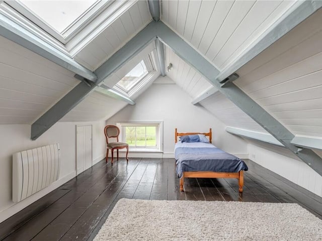 Versatile room space at the upper level.