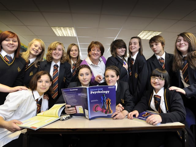 Teacher Michelle Wormald (centre, back) with her after school class GCSE Psychology pupils at Graham School. Pictured with her are students, back, Michelle Adamson (L), Rosie Roberts, Lily Woollons, Nicole Chapman, Angie Bell, Olivia Burlinson, Luke Kay, Rhianna Wood; front, Kate Gledhill, Emily Painter, Alex Correia and Jess Sanderson. 103824b