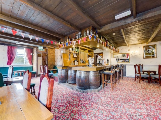 The bar area, with beamed ceiling.