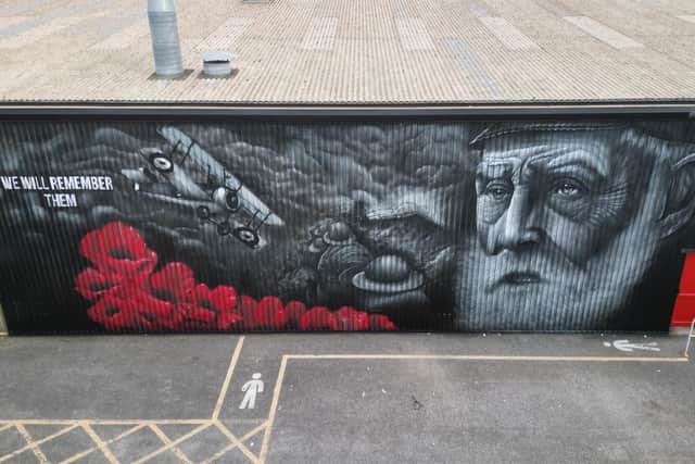 Rew Nurse's striking Remembrance Mural on the side of SWC on Dunslow Road was completed in 2023. Image: Rew Nurse.