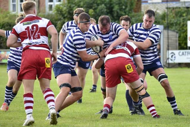 Andy Argo-Bennett leads a Pocklington pack charge. PHOTOS BY ANDY NELSON