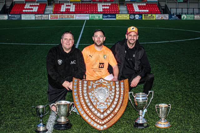 From left, Edgehill boss Alec Coulson, with assistants Joel Ramm and Wayne Aziz, with their trophy haul from the 2023-24 campaign.