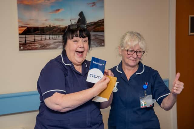 Staff at Saint Catherine's Hospice open their donation