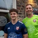 Billy Leach and keeper Joe Cracknell show off the new Boro away kit at the launch event at Scholar's Bar on Friday evening.