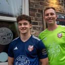 Billy Leach and keeper Joe Cracknell show off the new Boro away kit at the launch event at Scholar's Bar on Friday evening.