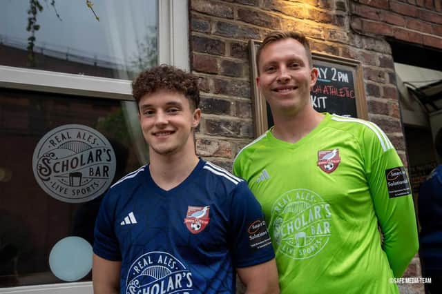 Billy Leach and keeper Joe Cracknell show off the new Boro away kit at the launch event at Scholar's Bar on Friday evening.