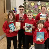 Fylingdales School youngsters with some of the new books.