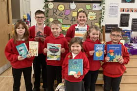 Fylingdales School youngsters with some of the new books.