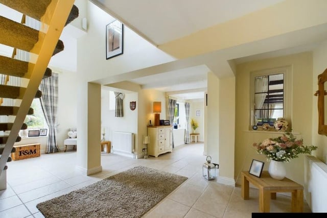 The double height reception hall gives an impressive entry to the property.