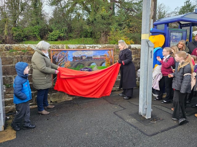 The plaque is revealed