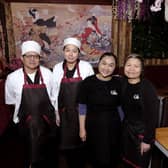Owner Lapatrada Khankaew, second from the left, and her family and friends.