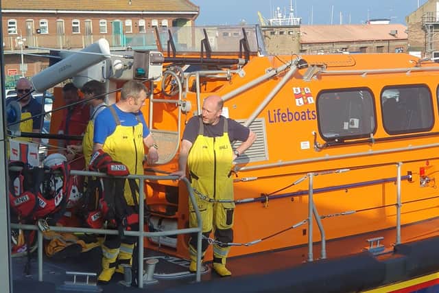 Arron and Will on the shannon class lifeboat - Image: RNLI Scarborough