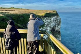 Bird watchers at RSPB Bempton Cliffs, near Bridlington