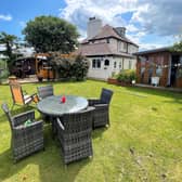 Landscaped gardens with the property include seating areas, a hot tub and two summerhouses.
