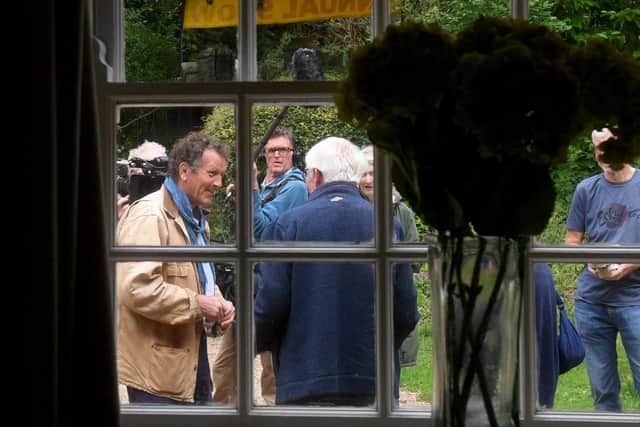 Monty Don is pictured filming at the gooseberry show held by the Egton Bridge Old Gooseberry Society.