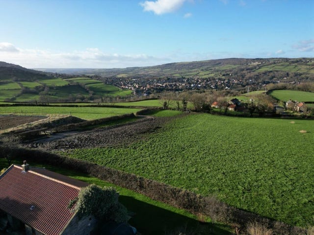 A valley view that stretches as far as the eye can see.