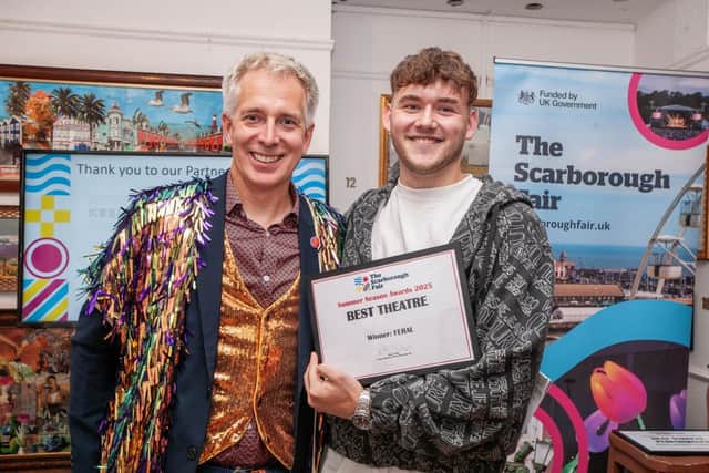 Keane Liley with his Best Theatre award presented by Scarborough Fair festival director Julian Caddy (credit Paul Wilson)