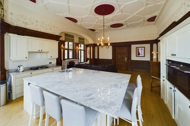 The living and dining kitchen is both functional and stylish.