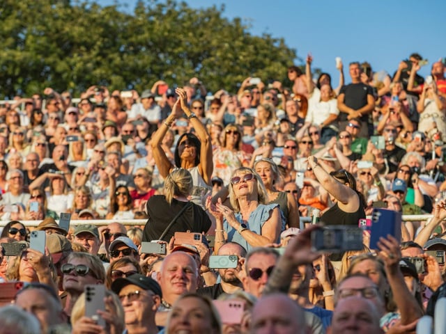 Enjoying the show in the summer sun