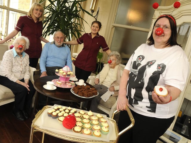 Esk Hall care home staff and residents serving cakes for Comic Relief raising £200 picture: Ceri Oakes, w131104e