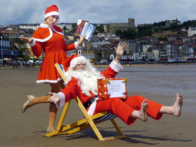 Santa takes his summer holiday in Scarborough with one of his helpers who is starring in Tony Peers Spa shows, Viva Las Vegas and Summer Spectacular.