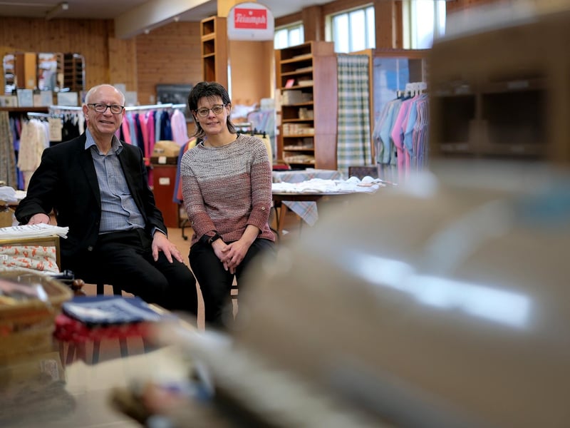 Steve Woolias, Ms Clough's accountant and Sue Walker together in the shop.
