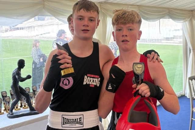 Scarborough's Mickey Grime (red kit) with Harrison Pudney. Photo by Glen Watkin Images
