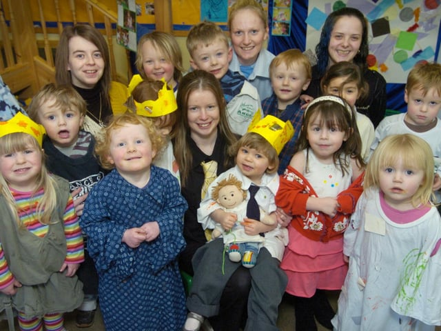 Staff and children at Harlequin Day Nursery, dressed as giants for World Book Day in 2009.