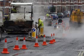 Road resurfacing work. Photo:  John Giles / PA.