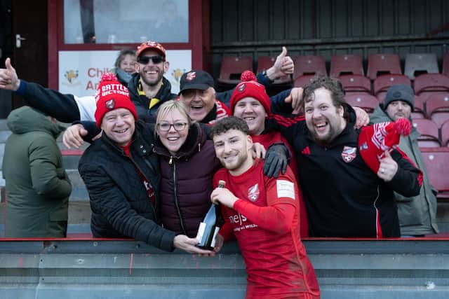 Boro fans cheer Alex Brown on as he collects his man of the match after the 1-0 home win against Curzon Ashton. Photo by Wandering Photography