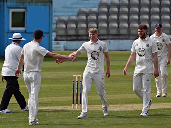 Promising youngster Hayden Williamson celebrates another wicket for Scarborough 1sts