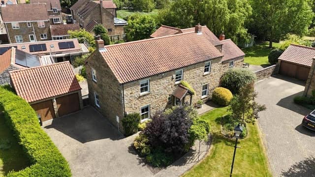 An overview of the front aspect of the property for sale in Irton village.