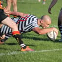 Pocklington RUFC skipper Joe Holbrough stretches out to score Pocklington's third try on Saturday. PHOTO BY PHIL GILBANK